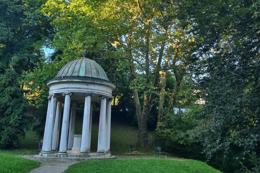 Aphrodite-Temple among green trees of Bauernbergpark