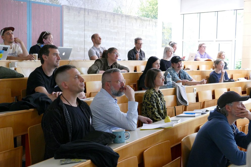 TAG Conference an der KU Linz. Bild: KU Linz/Eder. Wissenschaftler:innen und Forscher:innen im Hörsaal der KU Linz.